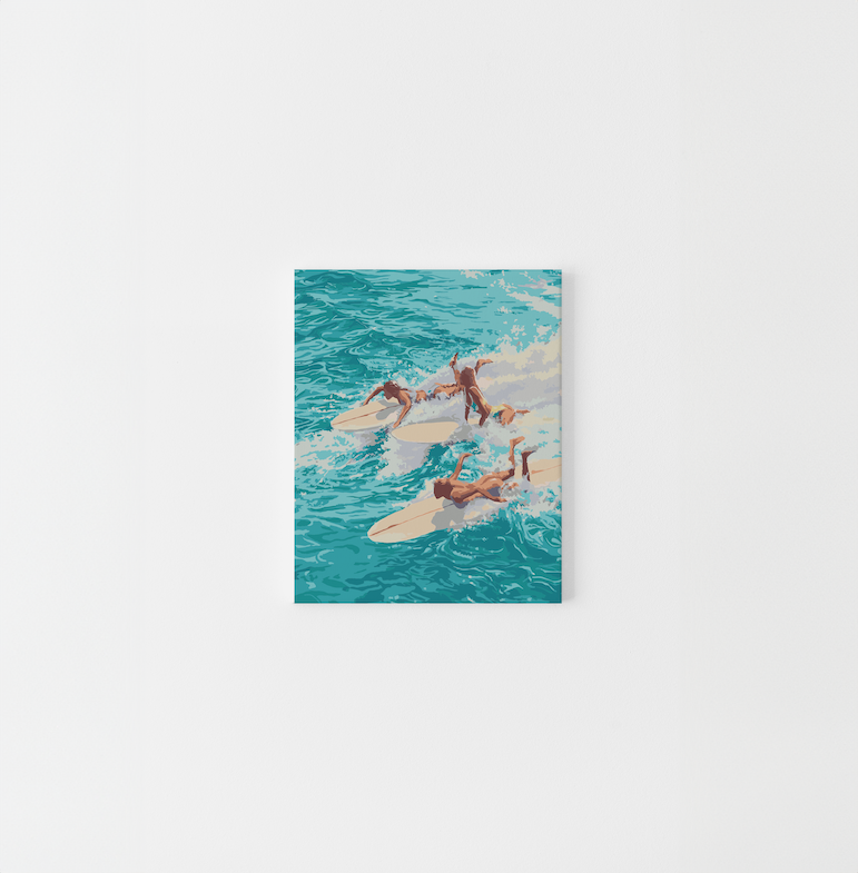 Paint Like Frida’s Chaos Mini Framed Canvas — a compact paint by numbers artwork featuring three surfers diving into turquoise waves, pre-stretched and ready to hang in a lightweight wooden frame.