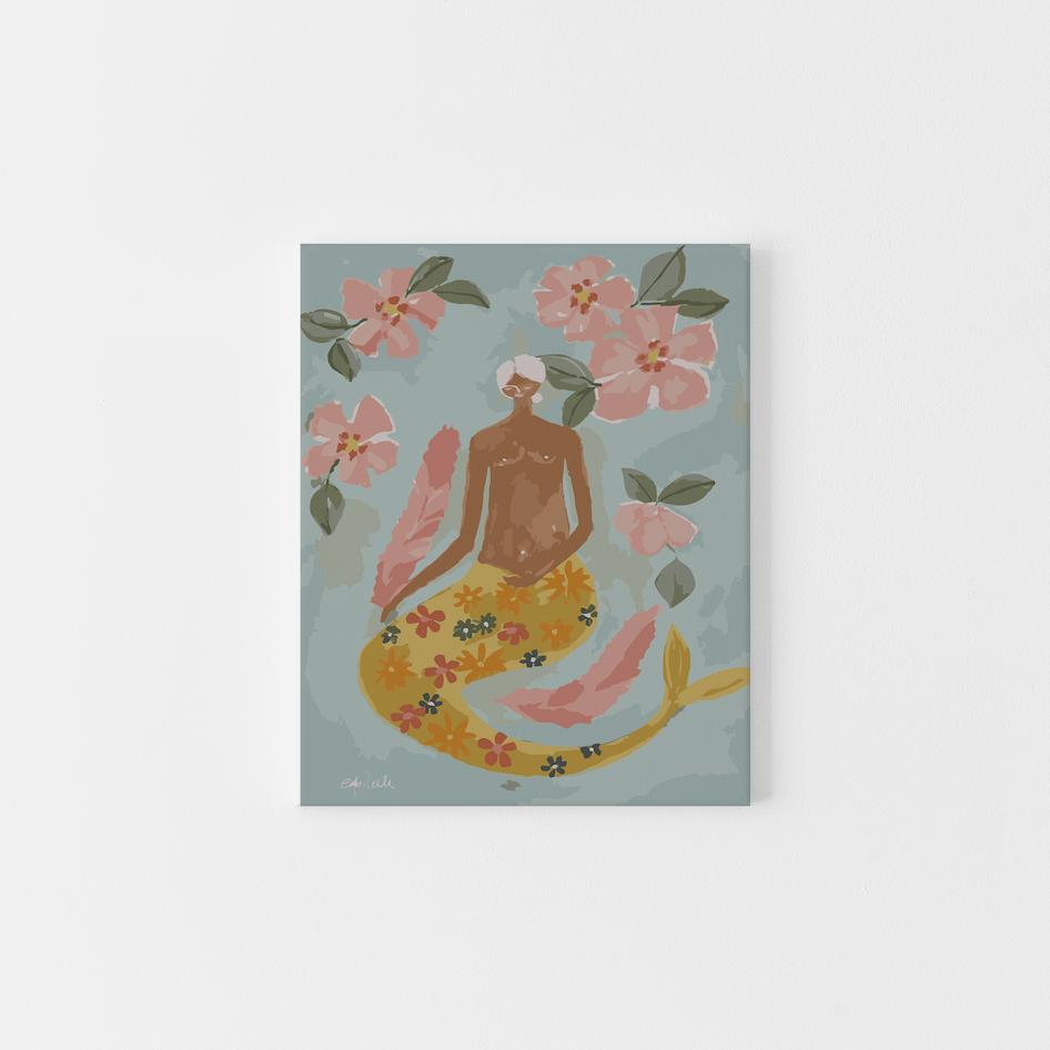 Paint Like Frida’s Lady of the Sea Big Framed Canvas — a dreamy paint by numbers artwork of a floral-tailed mermaid surrounded by pink hibiscus and soft feathers, framed in a custom wooden floating frame.